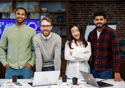 A team of young multinational business people are working on a startup. New generation of startups