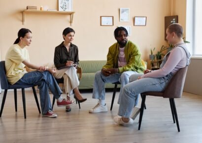 Group of people sitting at psycho session