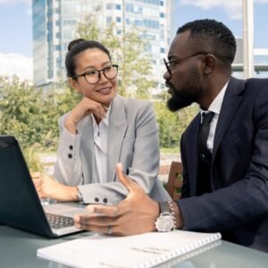 Two business partners discussing new strategies and ideas