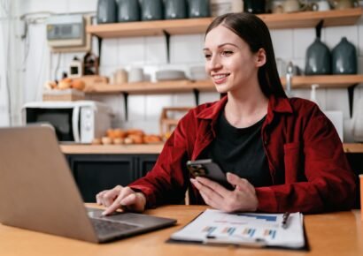 Young businesswoman using smartphone to searching business infor