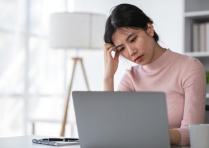 Young Woman Stressed at Work, Overwhelmed Female Professional, Office Stress, Workplace Anxiety